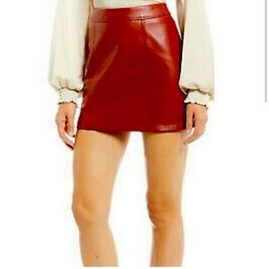 Burnt Red Rachel Mini Skirt, in genuine leather, by Gianni Bini. Size l